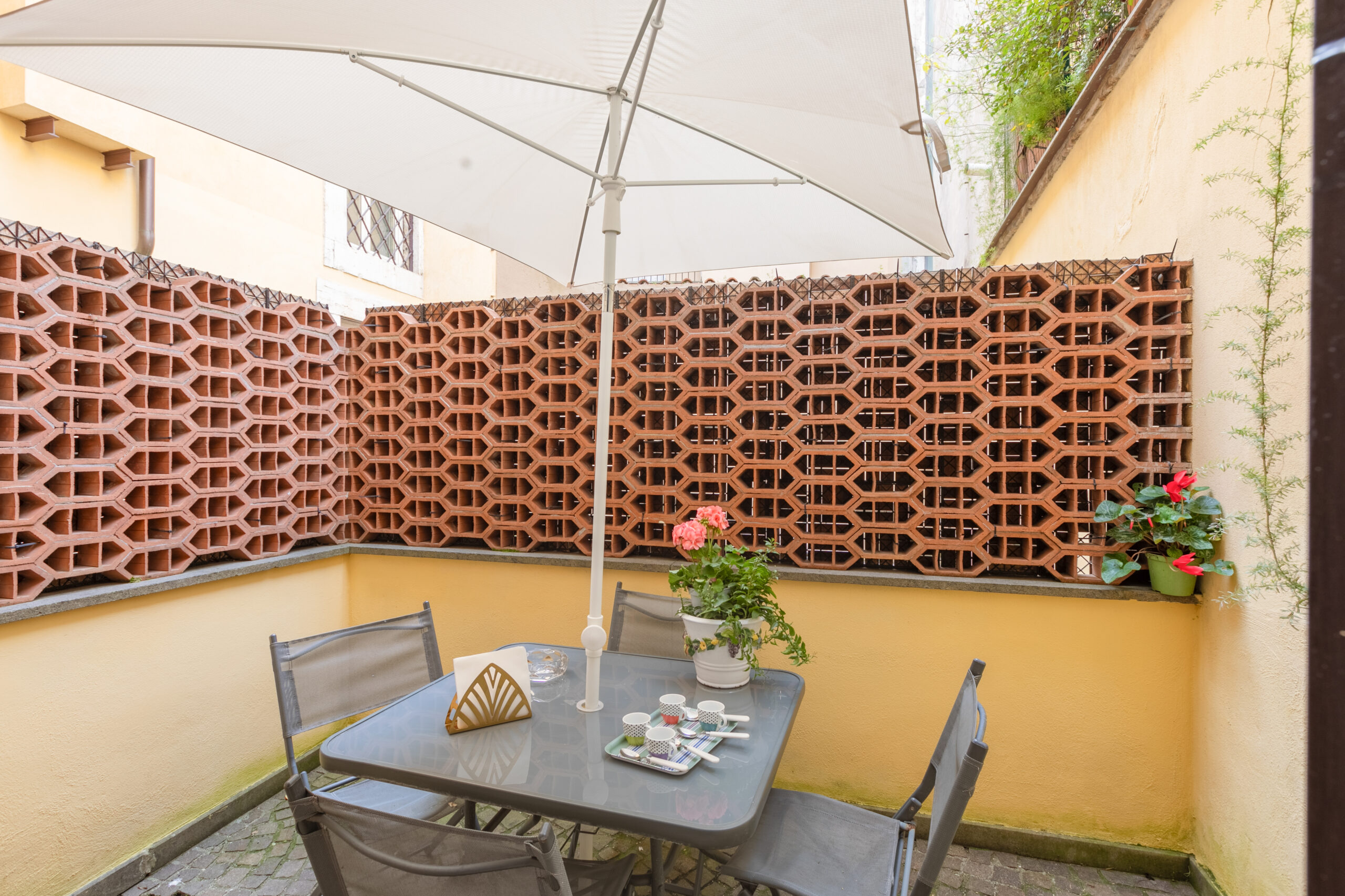 Outdoor patio at Quiet Trevi Fountain Apartment, Rome
