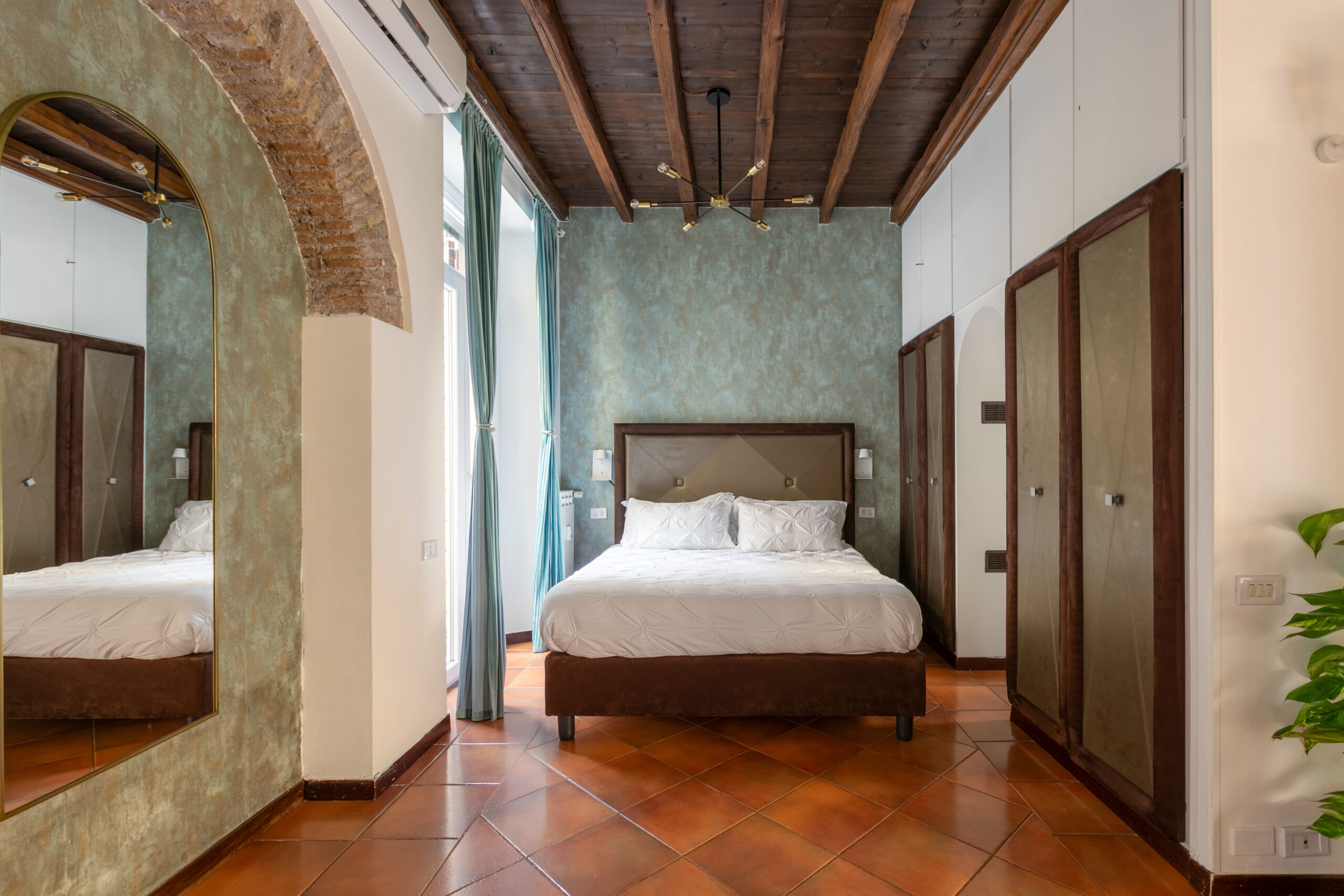 Bedroom at Quiet Trevi Fountain Apartment