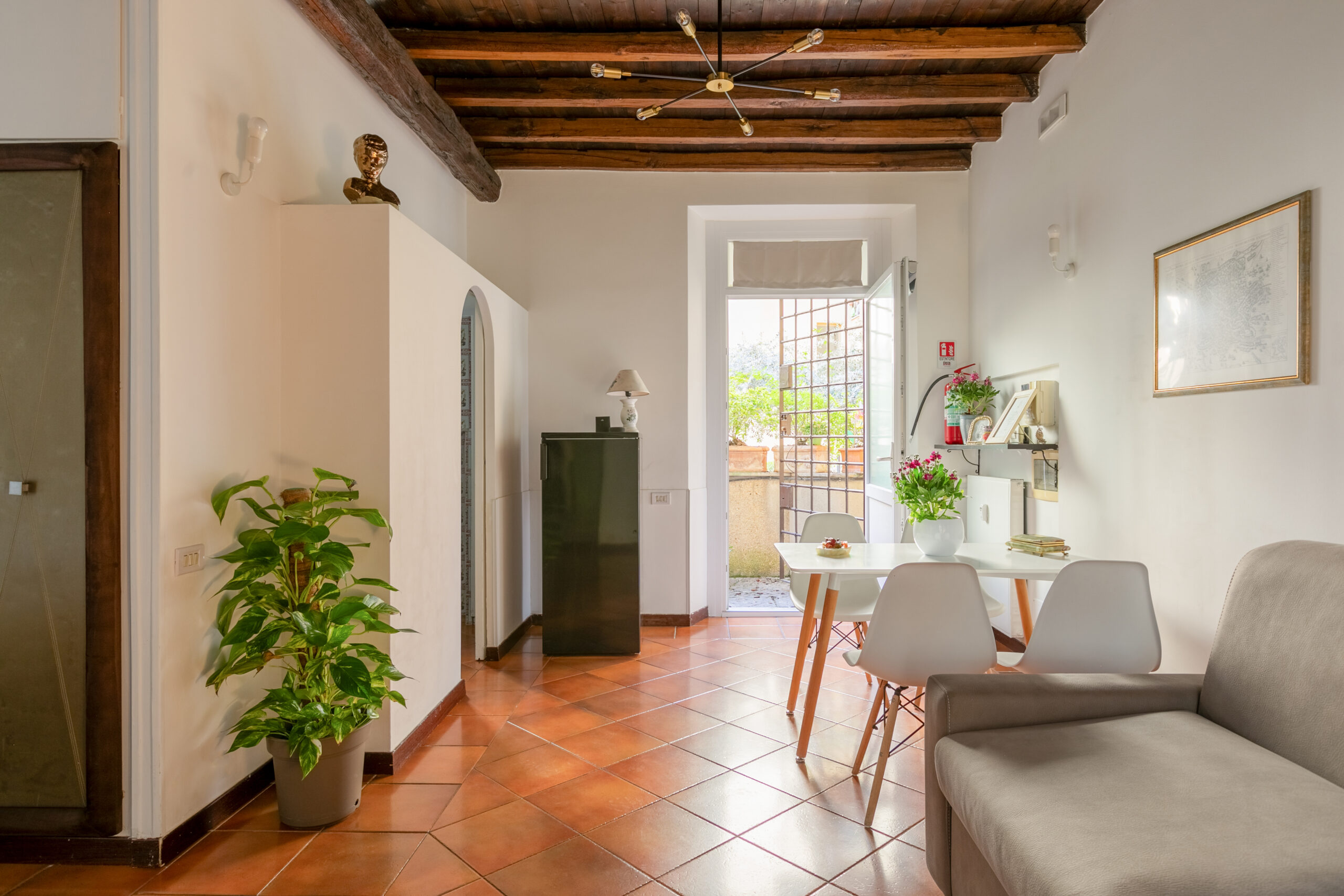 Cozy living room corner at Quiet Trevi Fountain Apartment, Rome