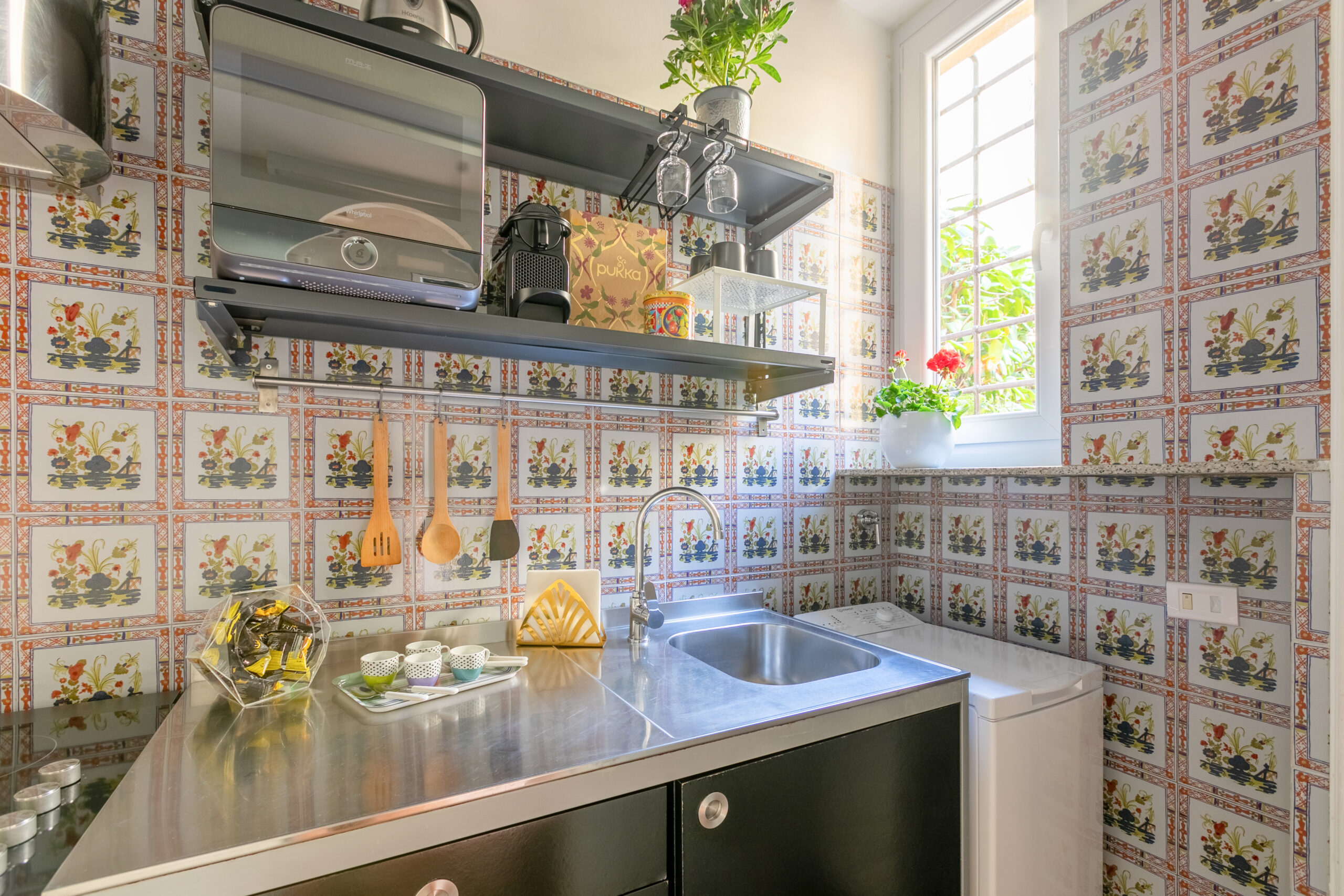Kitchen details and dining area in Quiet Trevi Fountain Apartment, Rome